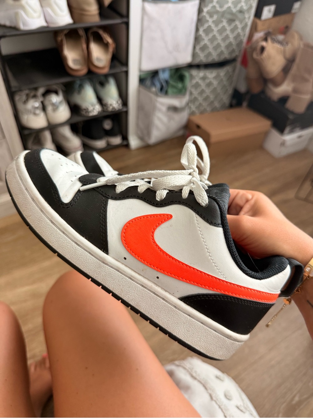 Nike kids White and Black Sneaker with Bright Orange Swoosh
